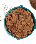 scoop of organic cocoa powder