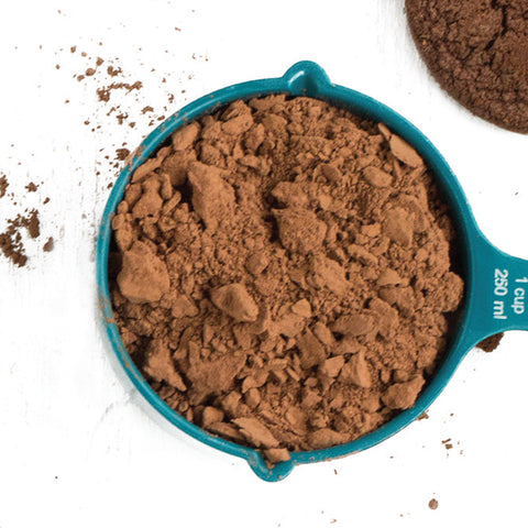 scoop of organic cocoa powder