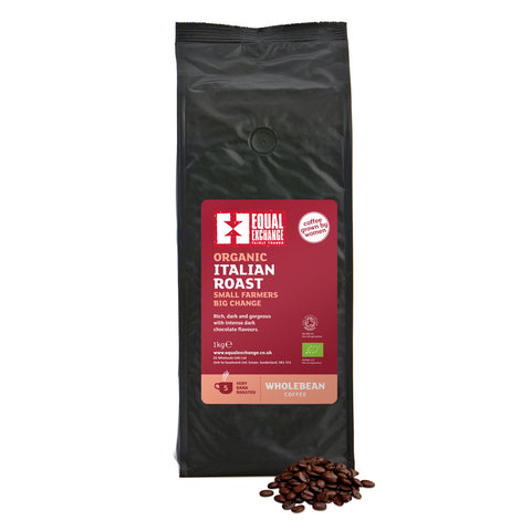 front of Organic Italian Roast coffee 1kg bag with pile of roasted beans