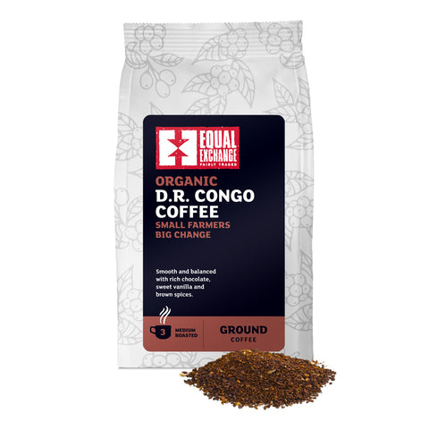 front of Organic D.R. Congo medium roast coffee bag with pile of ground coffee