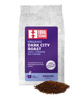 Organic Dark City Roast Ground Coffee bag with a pile of ground coffee