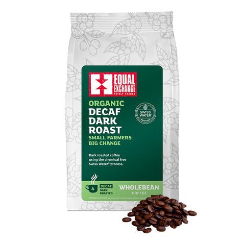 front of Organic Decaf Dark Roast coffee bag with pile of roasted beans