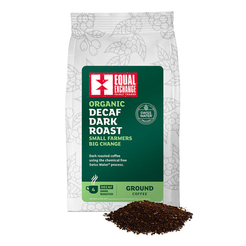 front of Organic Decaf Dark Roast coffee bag with pile of ground coffee