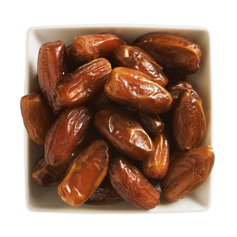 white square bowl filled with dates