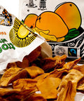 open Tropical Wholefoods bag with dried mangoes spilling out