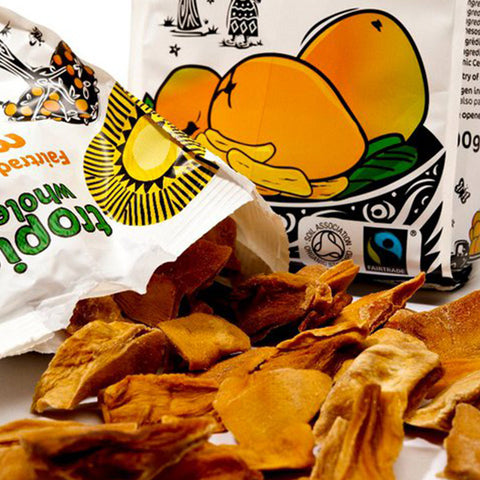 open Tropical Wholefoods bag with dried mangoes spilling out