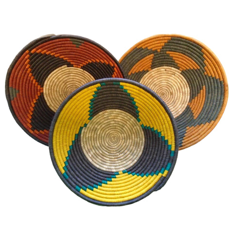 group of three handwoven baskets shown in red, yellow, and orange colors